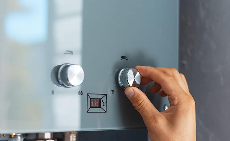 A Water Heater's temperature being adjusted.