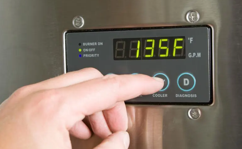 hand adjusting water heater